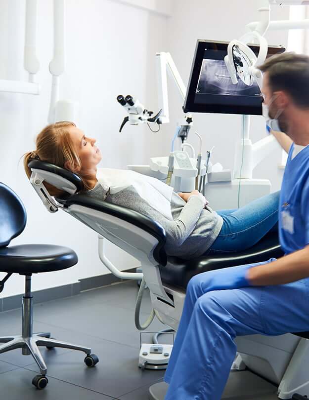 dentist working with a patient