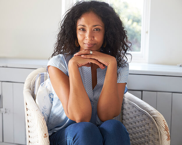 woman slightly smiling