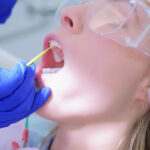 dental patient receiving a fluoride treatment