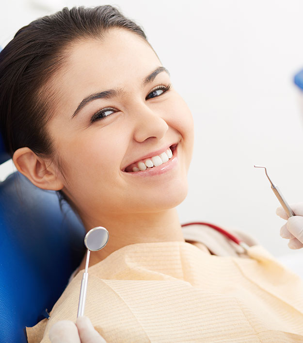 woman smiling at the dentist