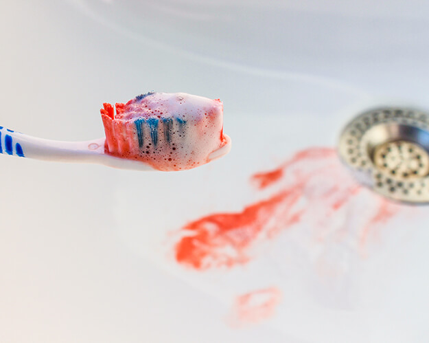 toothbrush with blood on it