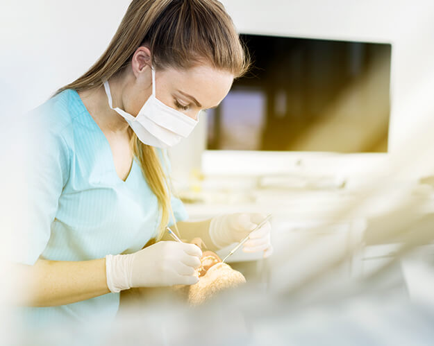 dental patient receiving a dental exam