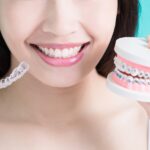 metal braces vs invisalign clear aligners