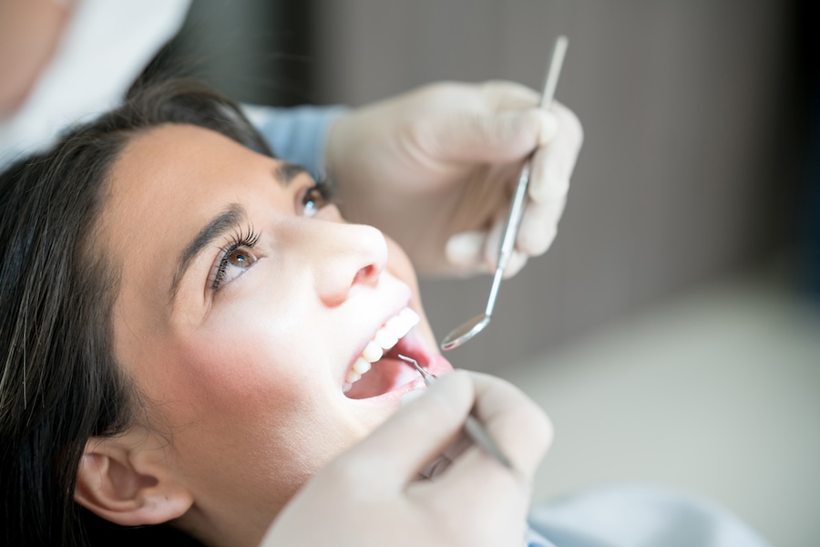 woman at the dentist for a routine dental visit